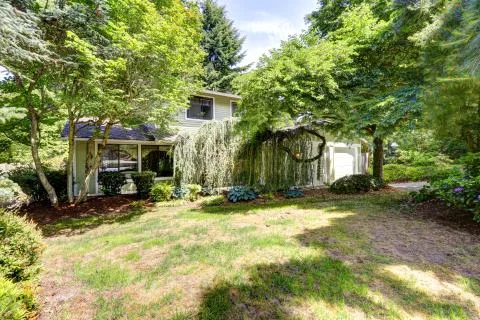 House with front yard landscape Stock Photos