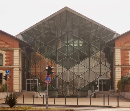 A house with a glass triangular facade 스톡 사진
