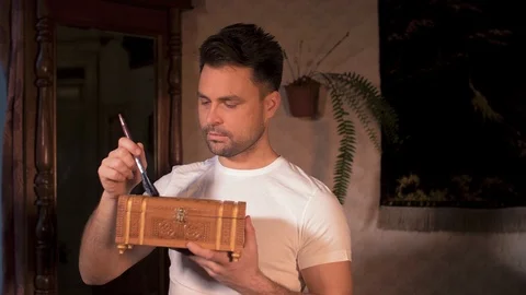 The house guy does the restoration of his antiques Stock Footage 106305215