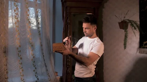 The house guy does the restoration of his antiques Stock Footage 106389780