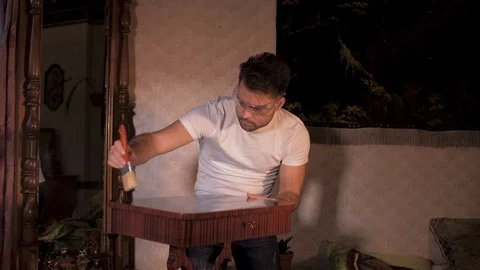 The house guy does the restoration of his antiques Stock-Footage 106392617