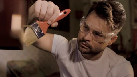 The house guy does the restoration of his antiques Stock Footage 106393126