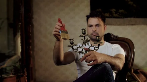 The house guy does the restoration of his antiques Stock Footage 106474259