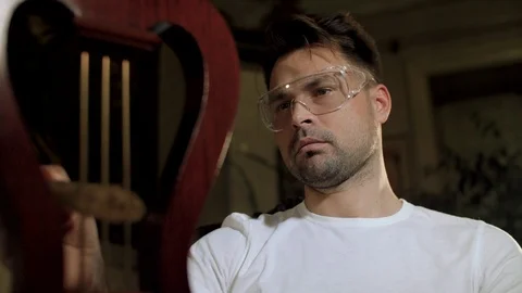 The house guy does the restoration of his antiques 스톡 동영상 106477510