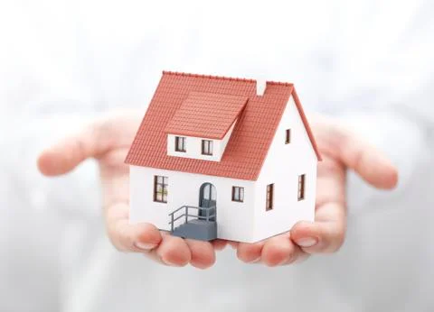House in hands Stock Photos