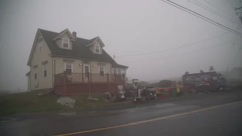 A house that has a sign on the side of a road Stock Footage 156013752