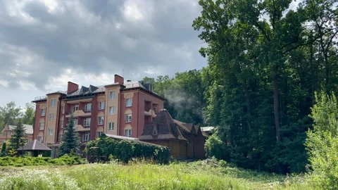 The house is a hotel in the middle of the forest Stock Footage 251887273