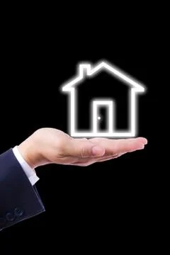 House icon on hand Stock Photos