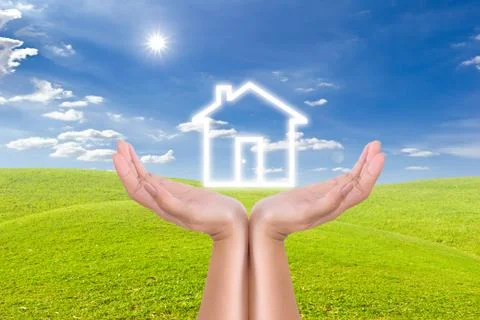 House icon on hand Stock Photos
