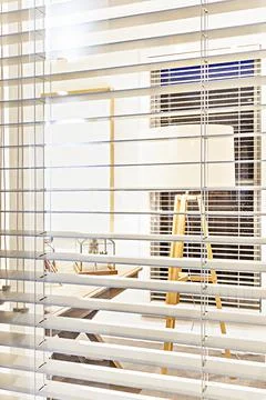 House interior with a window close up including the cover Stock Photos