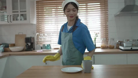 House keeper clean kitchen. Stock Footage 245283420