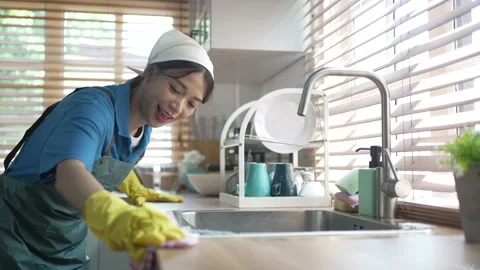 House keeper clean kitchen. Stock Footage 245283478