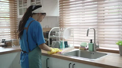 House keeper clean kitchen. Stock Footage 245283508