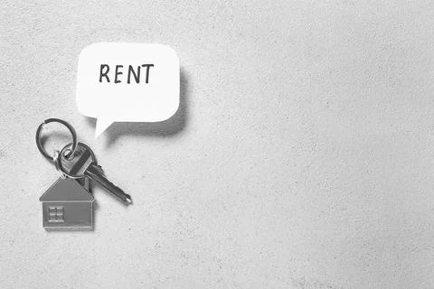 House key and speech bubble with word RENT on white grunge background Stock Photos