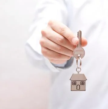 House key in hand Foto stock