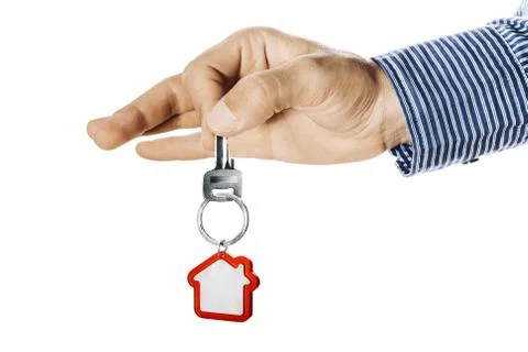 House key in hand Stock Photos