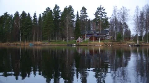 House on the lake Stock Footage 8997611