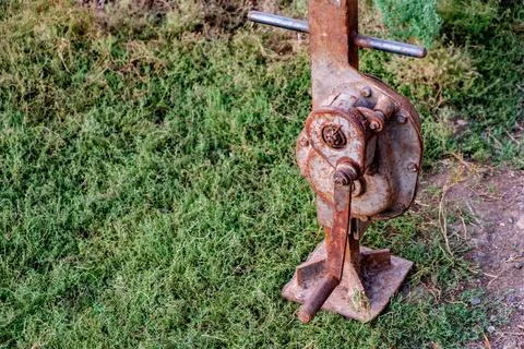 House lifting jack. Old rusty mechanical screw jack 写真素材