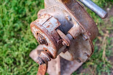 House lifting jack. Old rusty mechanical screw jack Stock Photos
