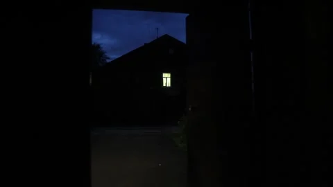 House With Light In The Window At Night Stock Footage 313700570