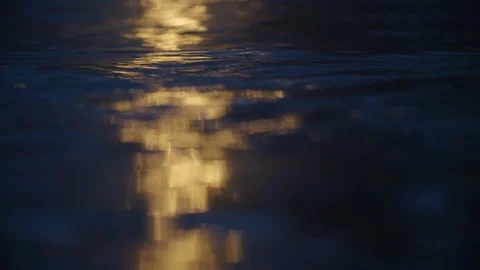House lights reflect and dance in flood waters, the river threatens water damage Stock-Footage 100132755