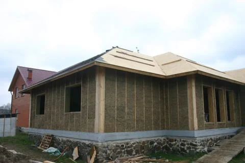 The house is made of a light adobe. Stock Photos
