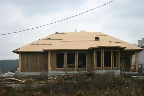 The house is made of a light adobe. Stock Photos