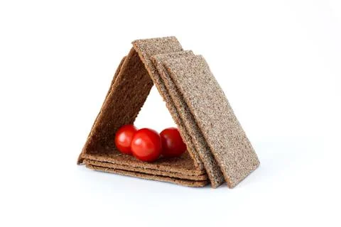 House made of rye crispbreads with Cherry tomatoes Stock Photos