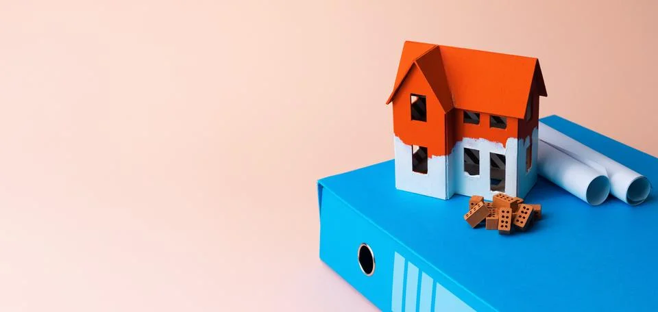 House Model and Construction Documents with Copy Space Photos