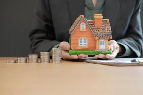 House model &amp; coins stack. saving money for buying house property. real estat Stock Photos