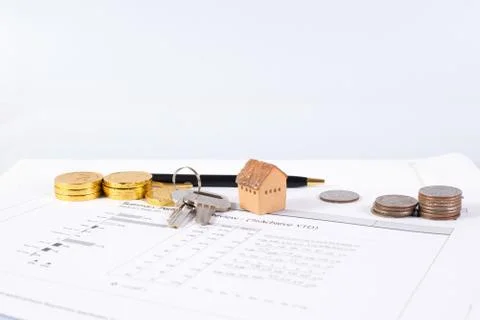 House model on the graph paper for planning your business Stock Photos