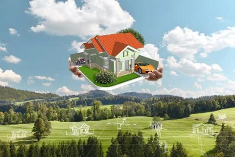 House model in hands over construction plan Stock Photos