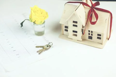 House model with key on documents Stock Photos