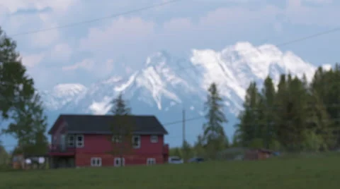 House with mountain backdrop Stock Footage 67610435