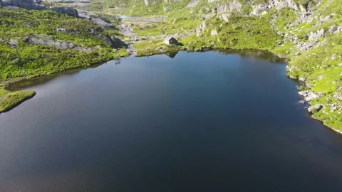 House in the mountains by the lake Stock Footage 202987003