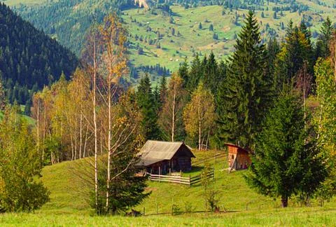House in the mountains Stock Photos