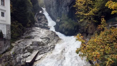 House next to waterfall Stock Footage 170768702