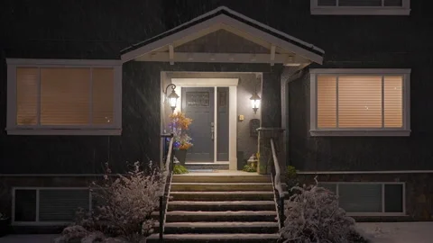 House with nice landscape at winter snowfall at night Stock Footage 213314672