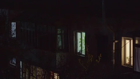 House at night and the light in the window Vidéo 107070843