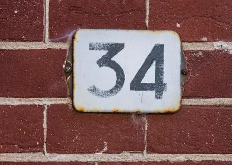 House number 34 Stock Photos