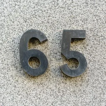 House number 65 Stock Photos