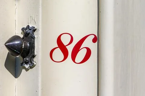 House number eighty six (86) Stock Photos