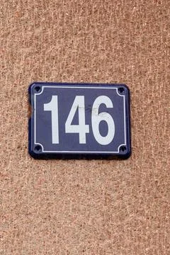 House number as a separate element one hundred forty-six Stock Photos