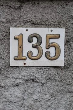 House number as a separate element one hundred thirty-five Stock Photos