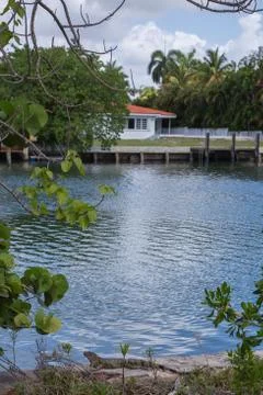 House on the opposite side of the river Stock Photos