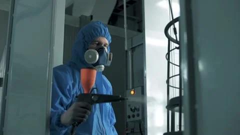 House painter paints metal structures with a pulverizer. Slow motion Stock Footage 179714228