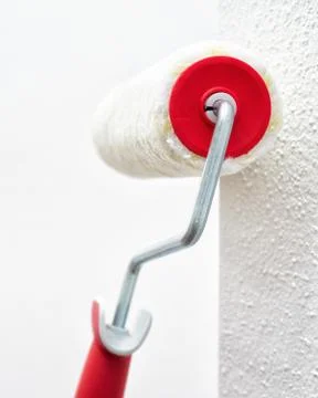 House painter, roller for painting. Building. Stock-Fotos