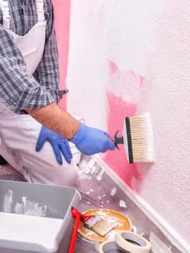 House painter worker at work in the construction site. Building. Stock-Fotos