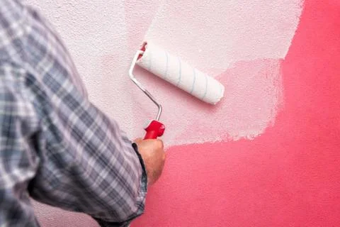 House painter worker at work in the construction site. Building. Stock-Fotos