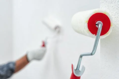 House painter worker at work in the construction site. Building. Stock-Fotos